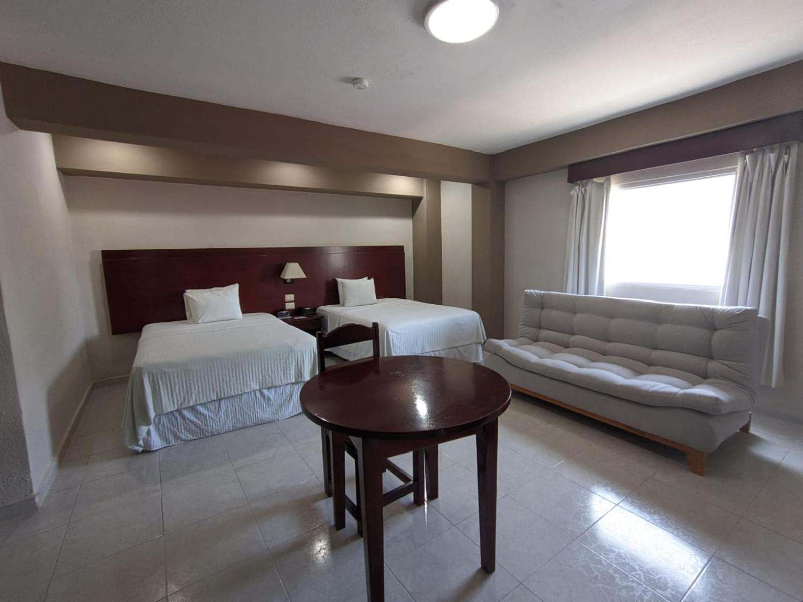 Hotel Maria Del Carmen Merida Bagian luar foto
